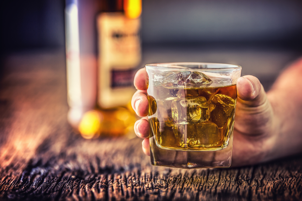 What are the most common reasons why people with alcoholism drink?