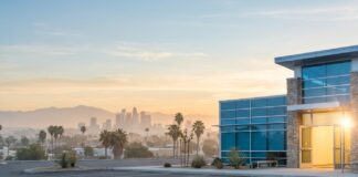 What Detox Programs in San Bernardino Accept IEHP San Bernardino sunrise outside a modern clinic symbolizing hope and access to IEHP Medi-Cal detox and withdrawal management services