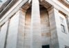 Opioid Settlement Money Passed 50 Billion Dollars. Tracking How It Is Spent Is Still Hard. The stone facade and columns of a historic American civic building.