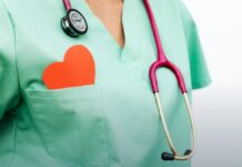 Alcohol and the Liver: The Stage That Is Still Reversible A clinician performing an examination in a medical office.