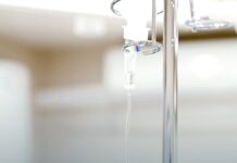 Alcohol Withdrawal Timeline: When Seizures and Delirium Actually Happen The exterior of a hospital building under an overcast sky.