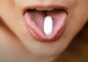 Counterfeit Pills: Why You Cannot Tell by Looking A close view of loose tablets held in an open palm.