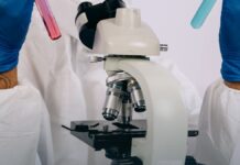 Xylazine: Why Naloxone Does Not Reverse It and Why the Wounds Spread A laboratory scientist examining samples with testing equipment.